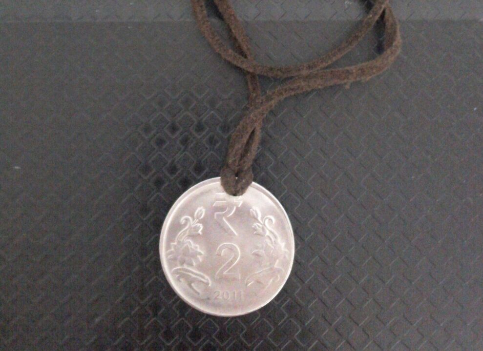 Monedă amuletă pentru a atrage bogăția
