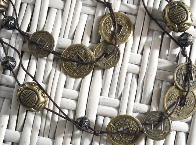 Monede chinezești ca o amuletă pentru bani